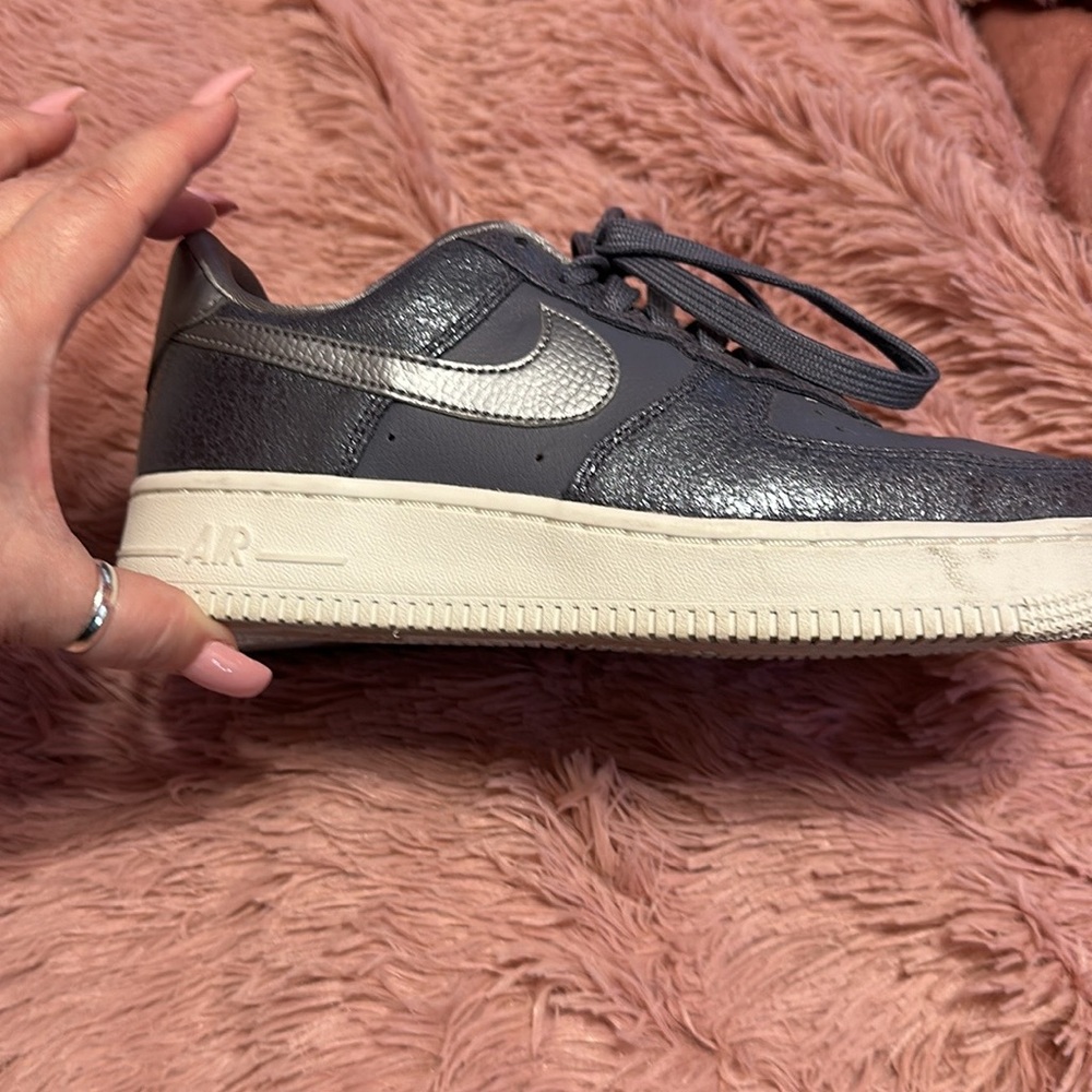 Women’s size 6.5 Nike Air Force One iridescent in color